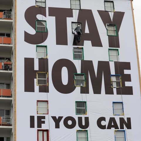 A billboard is installed on an apartment building 