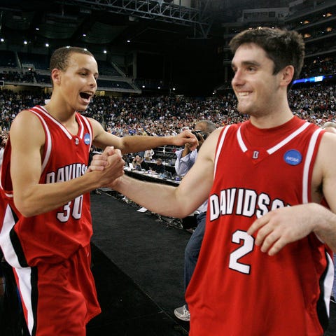 Davidson's Stephen Curry, left, and teammate Jason
