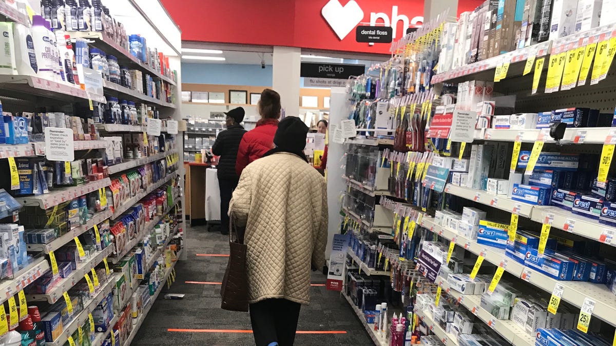 Tape marked every six feet is the way customers wait on line to see the pharmacist at CVS Pharmacy on Mamaroneck Avenue in White Plains March 26, 2020. The Coronavirus has people keeping their distance.