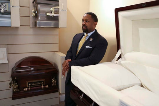 Justen Wright of the House of Wright Mortuary at his Wilmington funeral home Thursday.