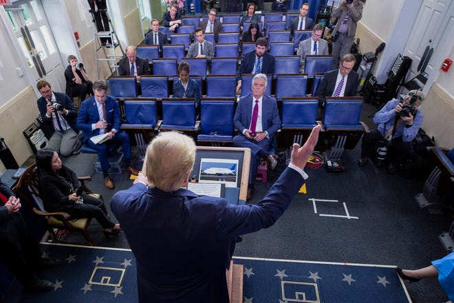 President Donald Trump speaks about the coronavirus in the James Brady Press Briefing Room, Friday, March 27, 2020, in Washington.