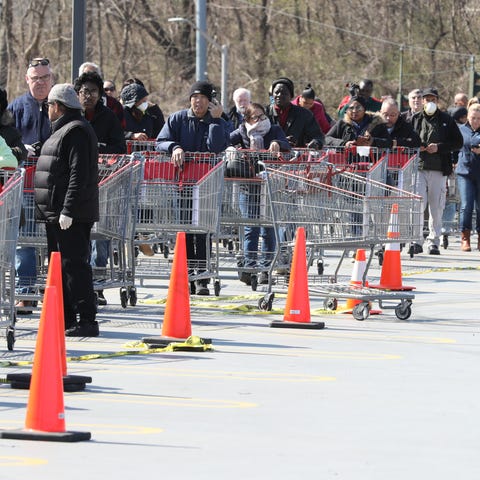 Shoppers at the Costco in Yonkers, line up in two 