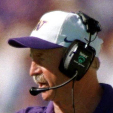 Washington coach Jim Lambright coaches the Huskies