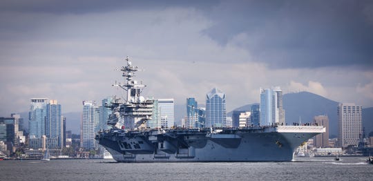 Navy Docks Carrier Marines Weigh Buzz Cuts As Virus Spreads