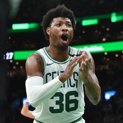 Marcus Smart reacts during the second half of a Ma