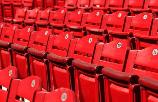 THURSDAY, MARCH 11, 2003 LARGE AMERICAN SPORT Seats along the baselines have a subtle slope to the palying field for easier viewing of fans at Great American Ball Park. Some seats have added seat cushions. Cincinnati Enquirer / Michael E. Keating mech