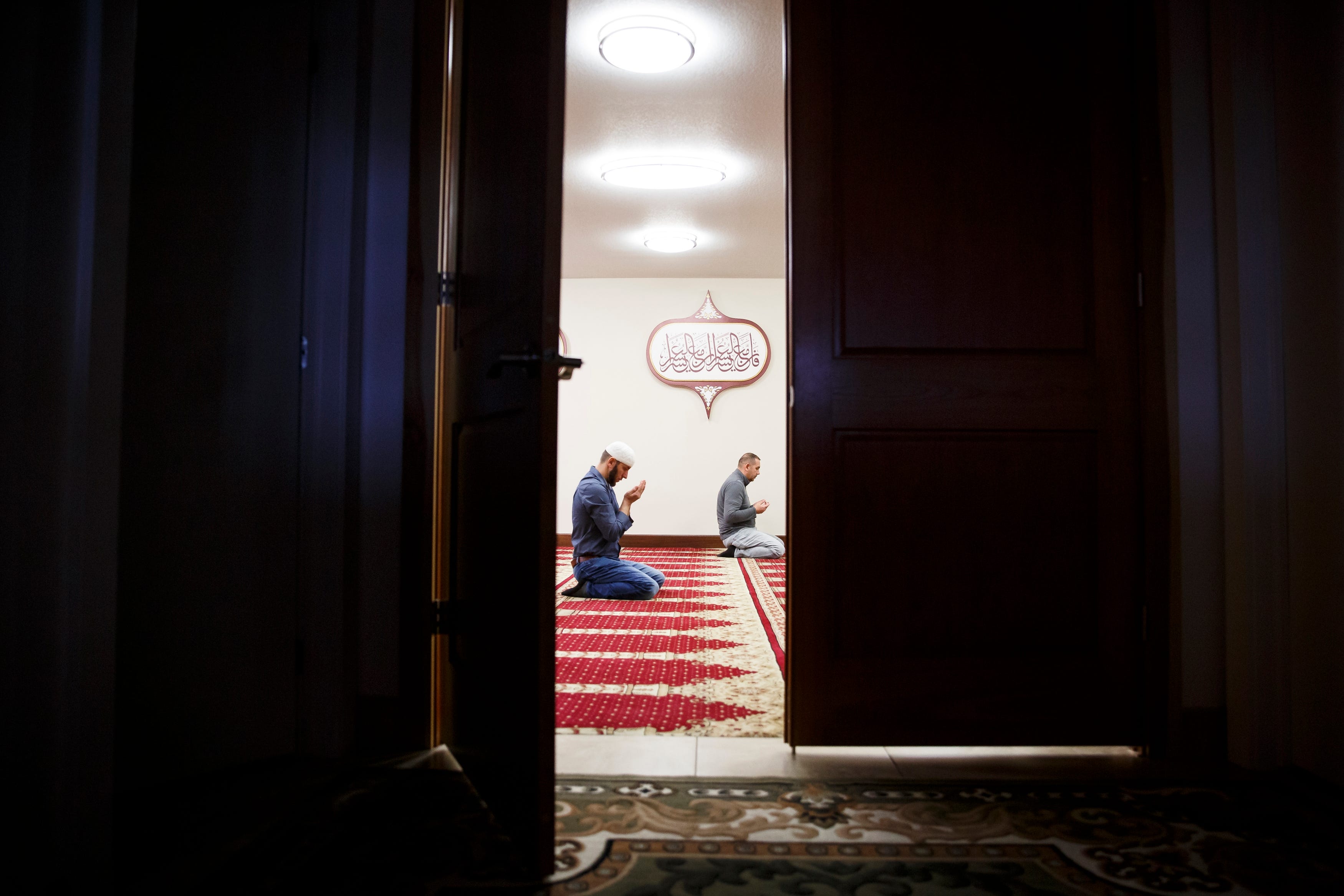 Meho Music prays during Jumah Prayer at the Islamic and Cultural Center Bosniak in Granger on Friday, March 27, 2020. The Friday prayer usually fills the room, but to comply with social-distancing rules, the ICC limited the prayer to just members of the board. "We have to respect the blessings we have," Imam Nermin Spahić said, adding that, right now, "This is the best option for us."