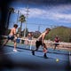 Kellen Flanigan (left) and Hudson Buth play pickleball with Riley Buth and Colleen Flanigan on the first day of Gov. Doug Ducey's "stay at home" order on April 1, 2020, at G.R. Herberger Park in Phoenix.