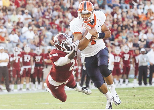 10. UTEP 42, New Mexico State 21, Sept. 14, 2013UTEP quarterback Jameill Showers outruns a diving Cameron Fuller of NMSU on his way into the end zone during the first half of at Aggie Memorial Stadium.