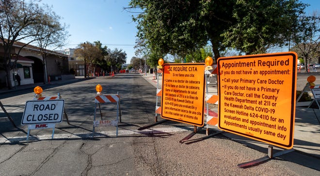 Floral Street between Acequia and Center and two parking lots were closed to accommodate Kaweah Delta nurses collecting nasal swabs for COVID-19 testing on Wednesday, April 1, 2020. Appointments are required.
