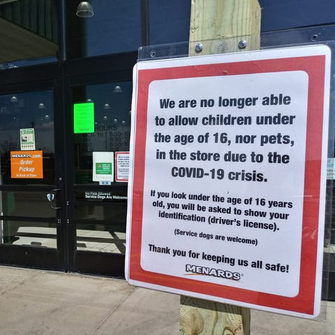 A sign relaying additional restrictions for Menard