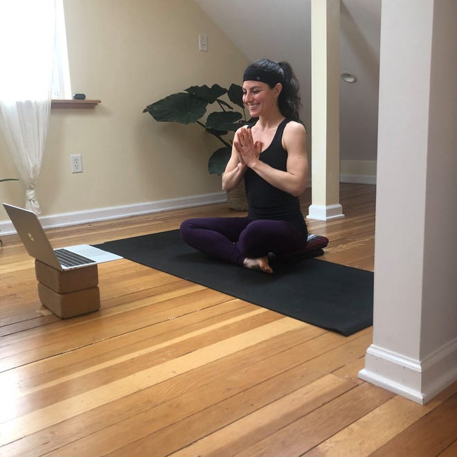Melanie Landgraf, the owner of Tosa Yoga in Wauwatosa, has been offering virtual classes to continue teaching yoga during the coronavrius pandemic.