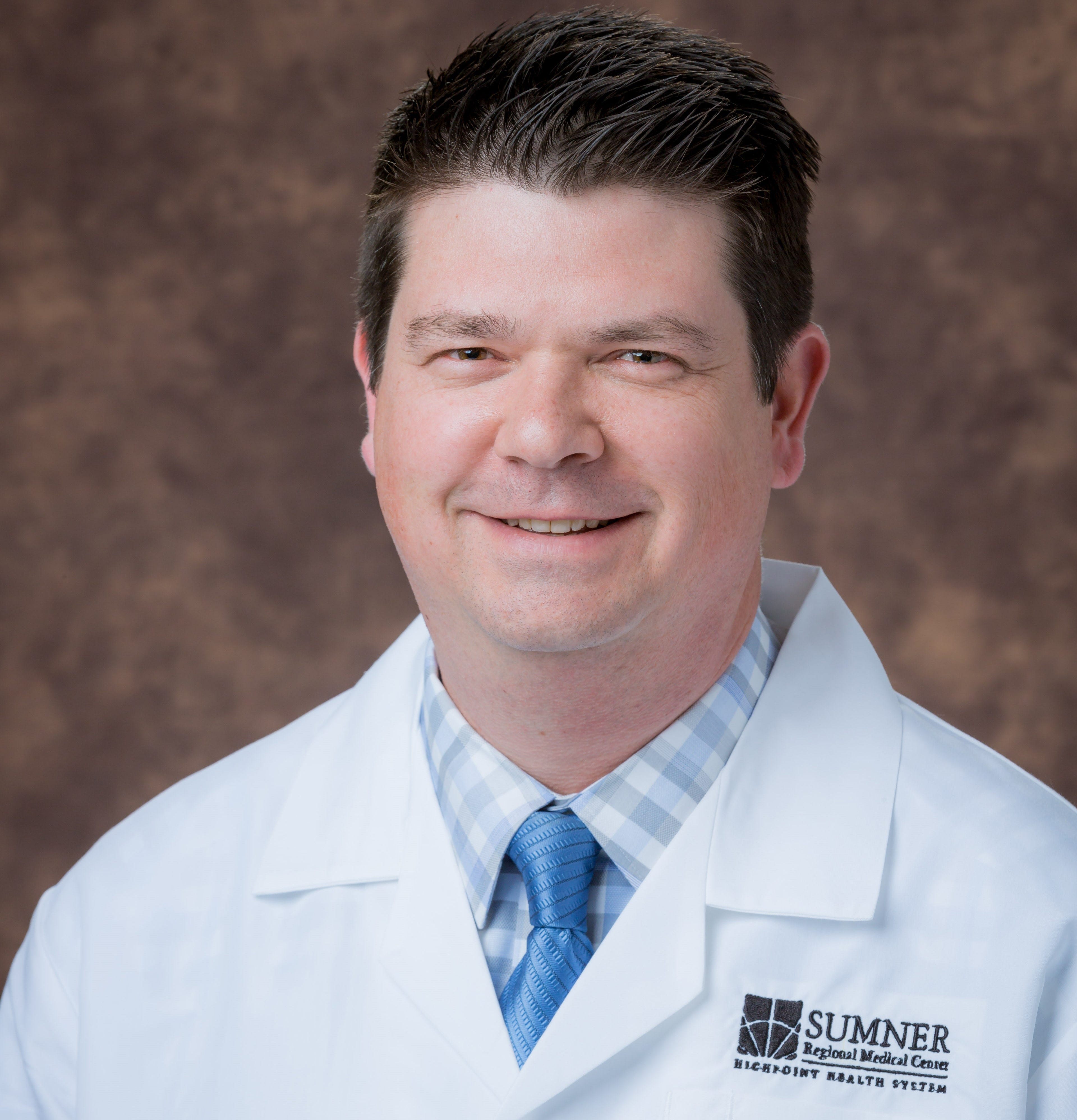 Dr. Jason Martin, 43. Pulmonary and critical care specialist at Sumner Regional Medical Center now working on the COVID unit.