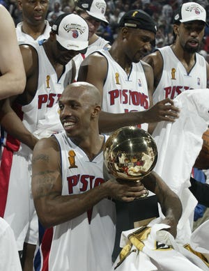 Detroit Pistons' Chauncey Billups holds his Finals MVP trophy after the 100-87 victory over the Lakers to win the NBA championship in Game 5 of the NBA Finals, Tuesday, June 15, 2004 at the Palace of Auburn Hills.