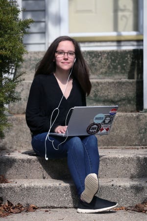 Izzy Boudnik a junior at UW-Madison at her home in Milwaukee on Wednesday, March 25, 2020. Boudnik helped start a petition to get the university to pay its students workers because they're out of work now that the university is shut down because of the coronavirus pandemic.