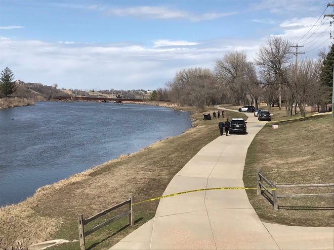 Authorities responded to an incident along the Big Sioux River on Sunday afternoon, blocking off a portion of the bike trail north of Sixth Street.
