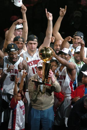 The Pistons celebrate their 2004 NBA championship after ousting the Los Angeles Lakers.