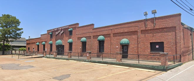 Kemmons Wilson Companies is planning to move its headquarters to the former Spaghetti Warehouse location in Downtown Memphis.