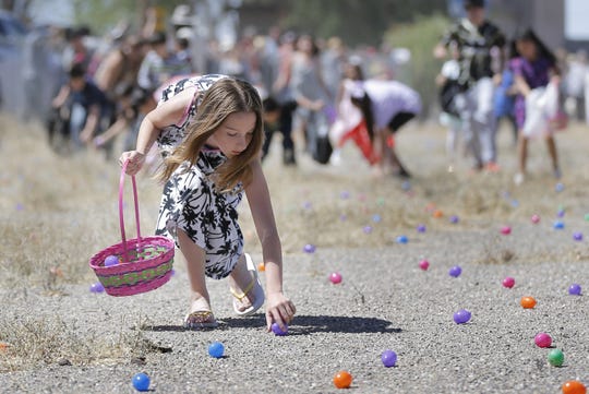 2016, Kids sprint to collect some of the 10,000 Easter eggs during the annual San Elizario Easter Egg Hunt on the town's Main Street. T