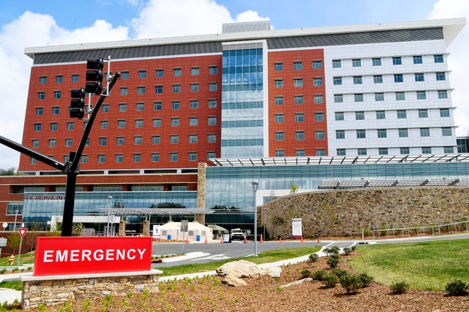 A tent has been set up outside the emergency entrance at Mission Hospital April 8, 2020 in the midst of the coronavirus pandemic.