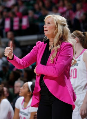 Michigan State coach Suzy Merchant signals during the second half of a game in February.  Merchant and the Spartans got a commitment from Penn State transfer Jayla James this week.