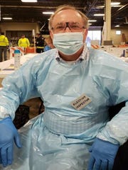 Assembly Speaker Robin Vos, R-Rochester, wore personal protective equipment while volunteering Tuesday at a polling station in Burlington.