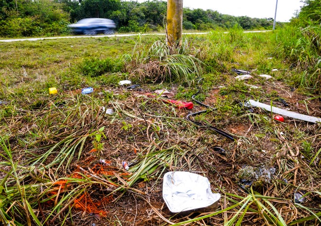 A debris field of car parts, personal items and paint markings left behind by the Guam Police Department's Highway Patrol Division, can be found at the site of a fatal auto-pole collision on Route 15, near the former Andersen South military housing, that claimed the life of a male driver during the early morning hours of Thursday, April 9, 2020.