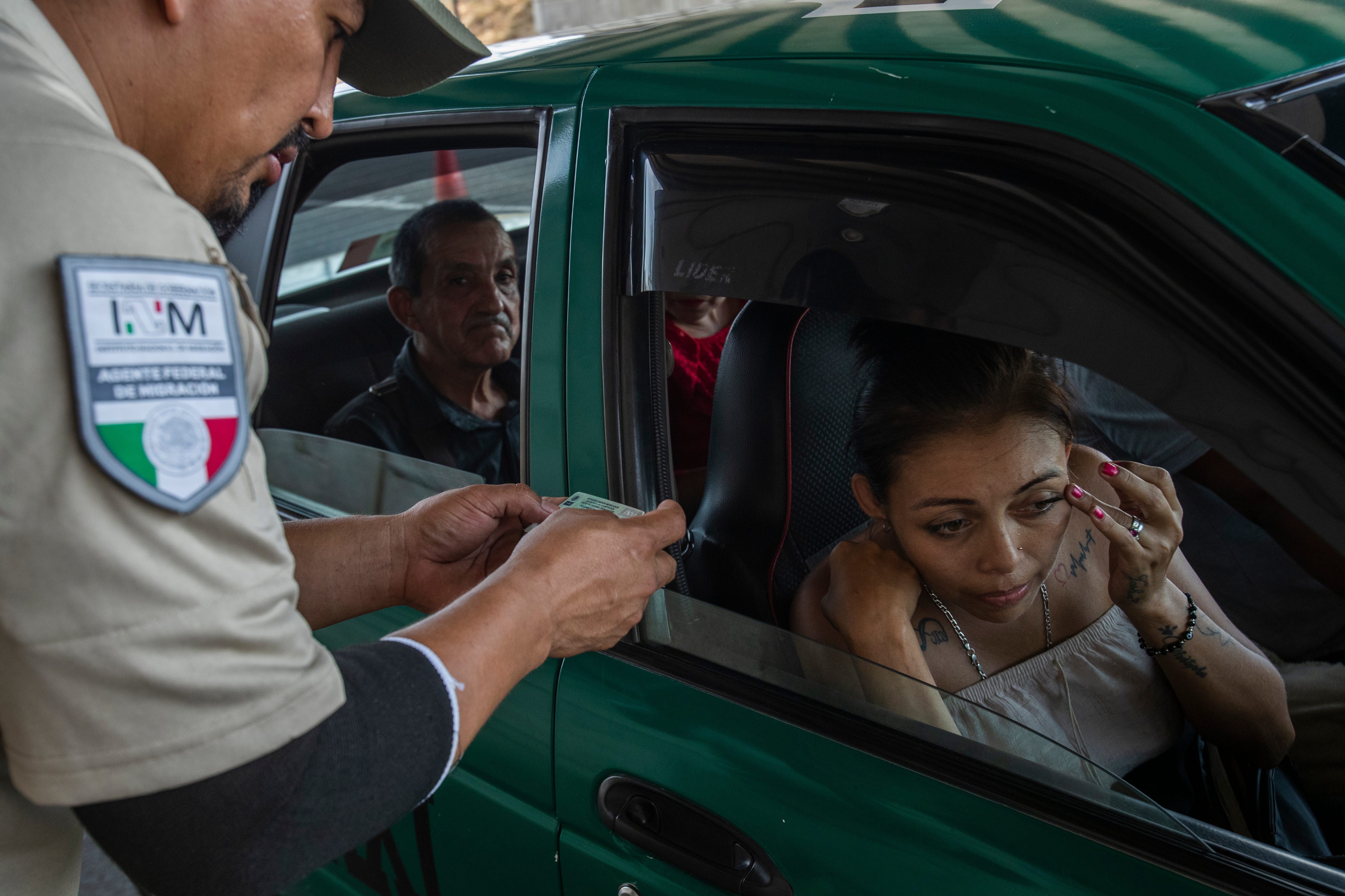 A Mexican immigration agent mans a checkpoint on a federal highway between the border crossing of Ciudad Hidalgo and Tapachula an hour north in late February.