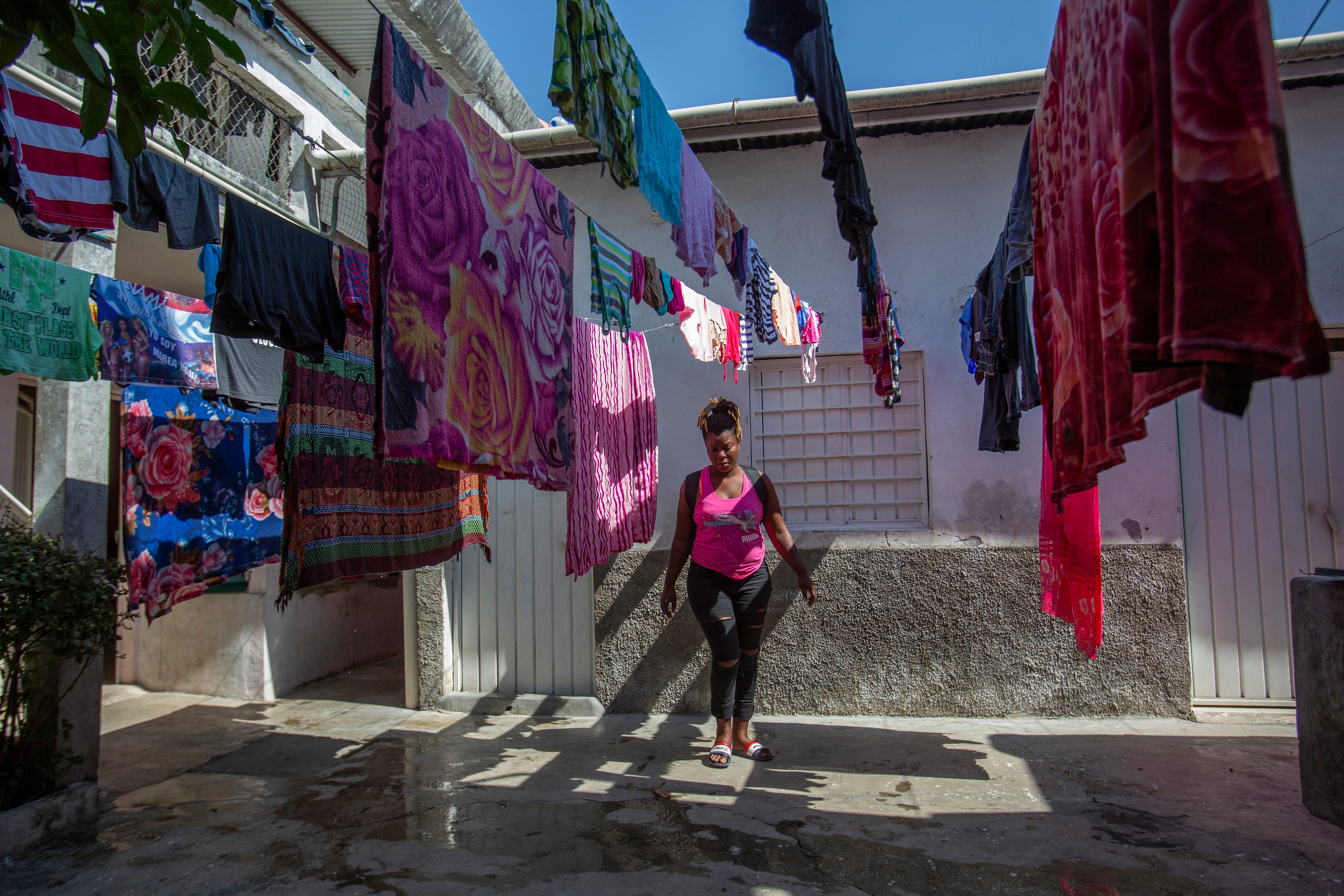 Gueurline Pierre and other Haitian migrants rent rooms in a two-story apartment building in Tapachula, Chiapas, as they arrive from South America.