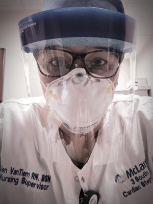 Jennifer VanTiem, a registered nurse and nursing supervisor at McLaren Port Huron, in her personal protective equipment.