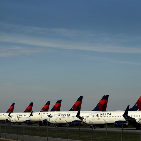 Several dozen Delta Air Lines jets are parked at K