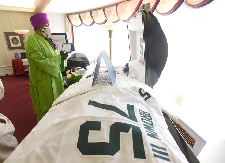 Cassandra Brown cries as she pays respects to her son, Freddie Lee Brown, III, who dreamed of playing football at MSU this fall as a walk on. Cassandra Brown cries as she pays respects to her son, Freddie Lee Brown, III, who dreamed of playing football at MSU this fall as a walk on.