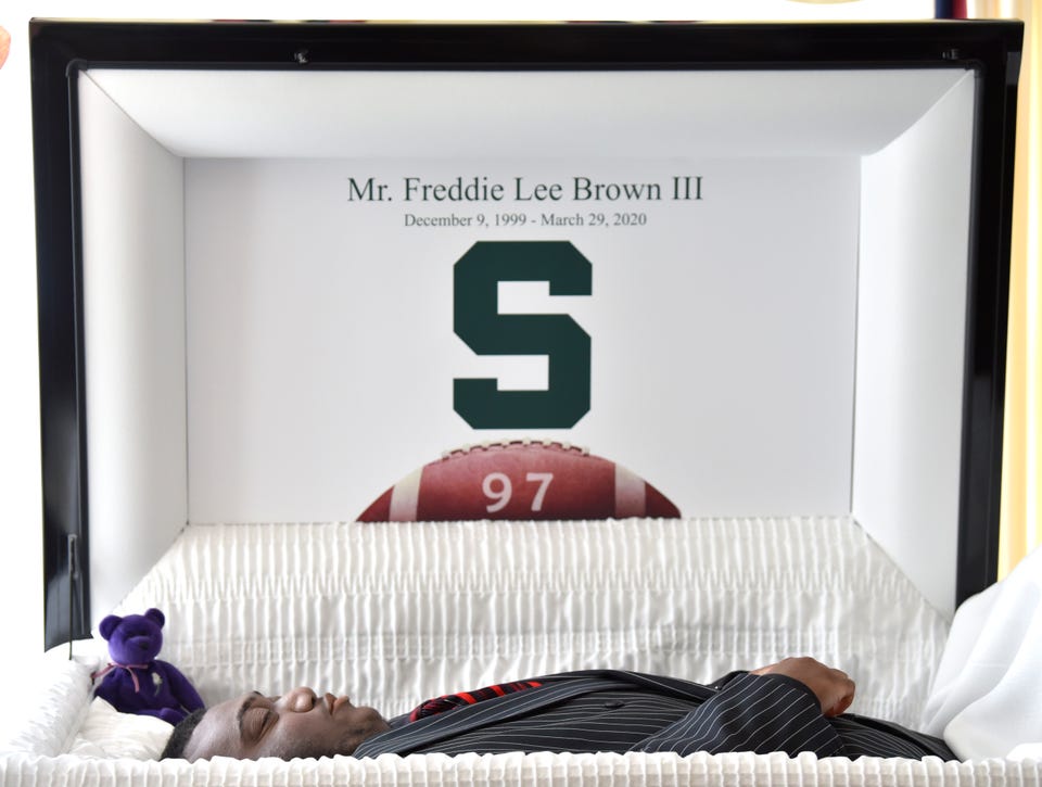 An MSU block S and his Grand Blanc High School Bobcats #97 is on the casket lid of Freddie Lee Brown, III. According to family members, Brown, III, dreamed of playing MSU football this fall as a walk-on and someday playing in the NFL. An MSU block S and his Grand Blanc High School Bobcats #97 is on the casket lid of Freddie Lee Brown, III. According to family members, Brown, III, dreamed of playing MSU football this fall as a walk-on and someday playing in the NFL.