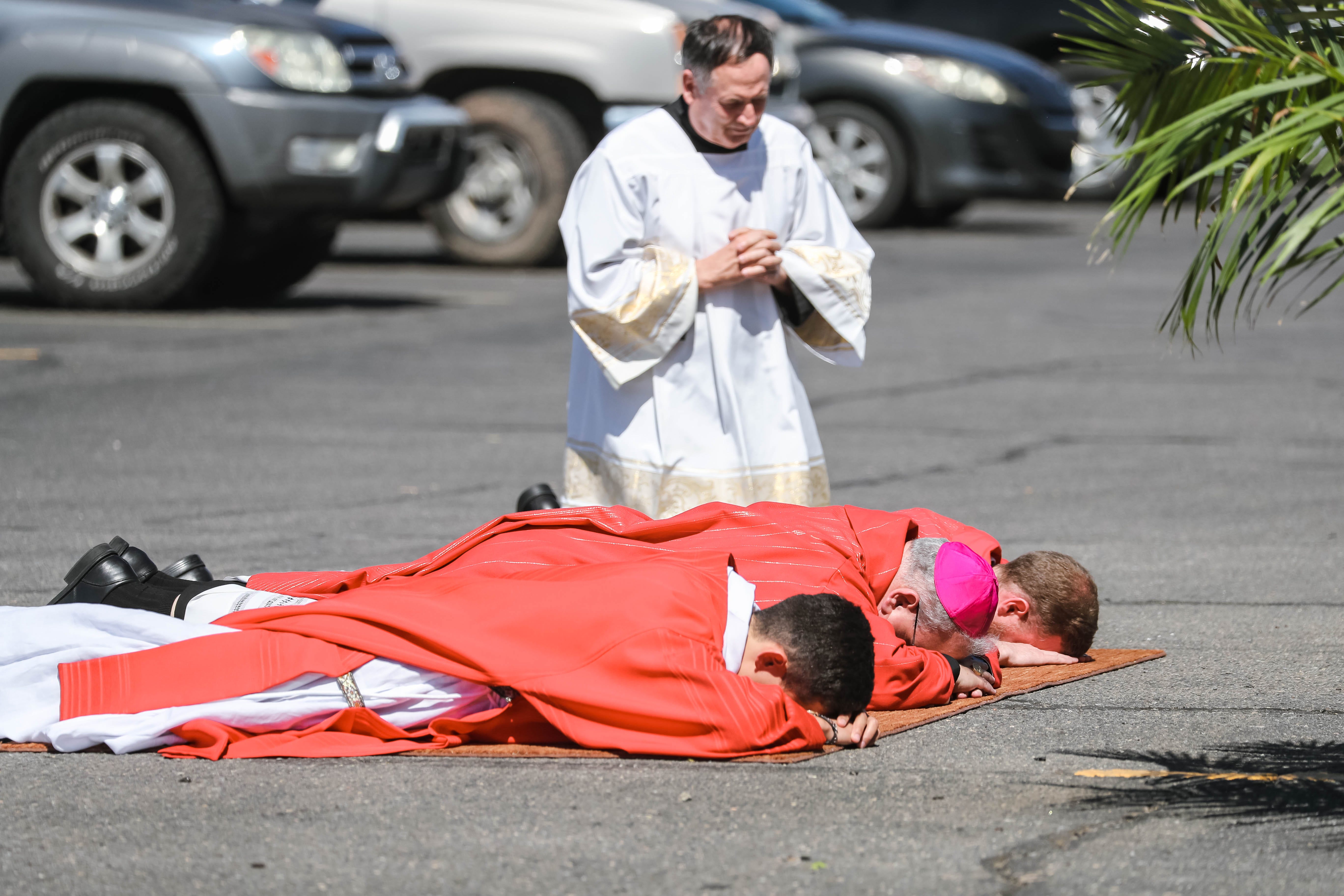 Good Friday services are held in the parking lot of Immaculate Heart of Mary in Las Cruces on Friday, April 10, 2020.