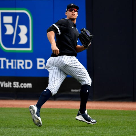Yankees right fielder Aaron Judge fields a ball du