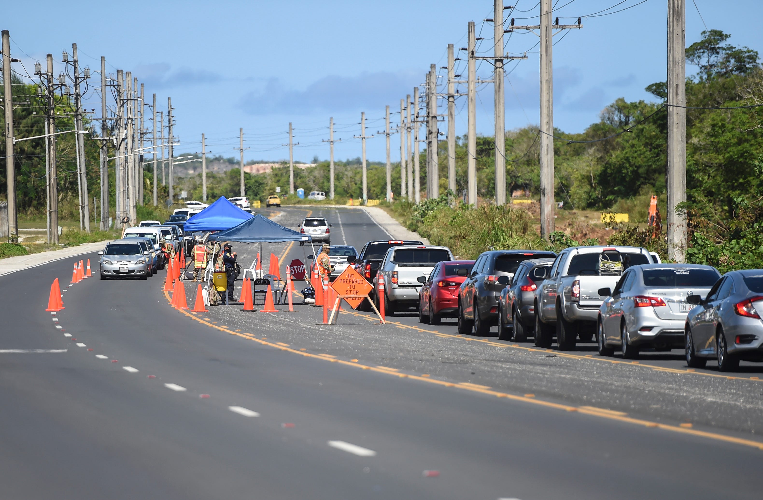 A road closure in Dededo creates long lines of traffic on Route 1, April 13, 2020.