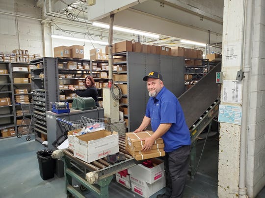 Village Ford employees in the parts department continued wholesale parts distribution during Michigan's shelter-in-place period.