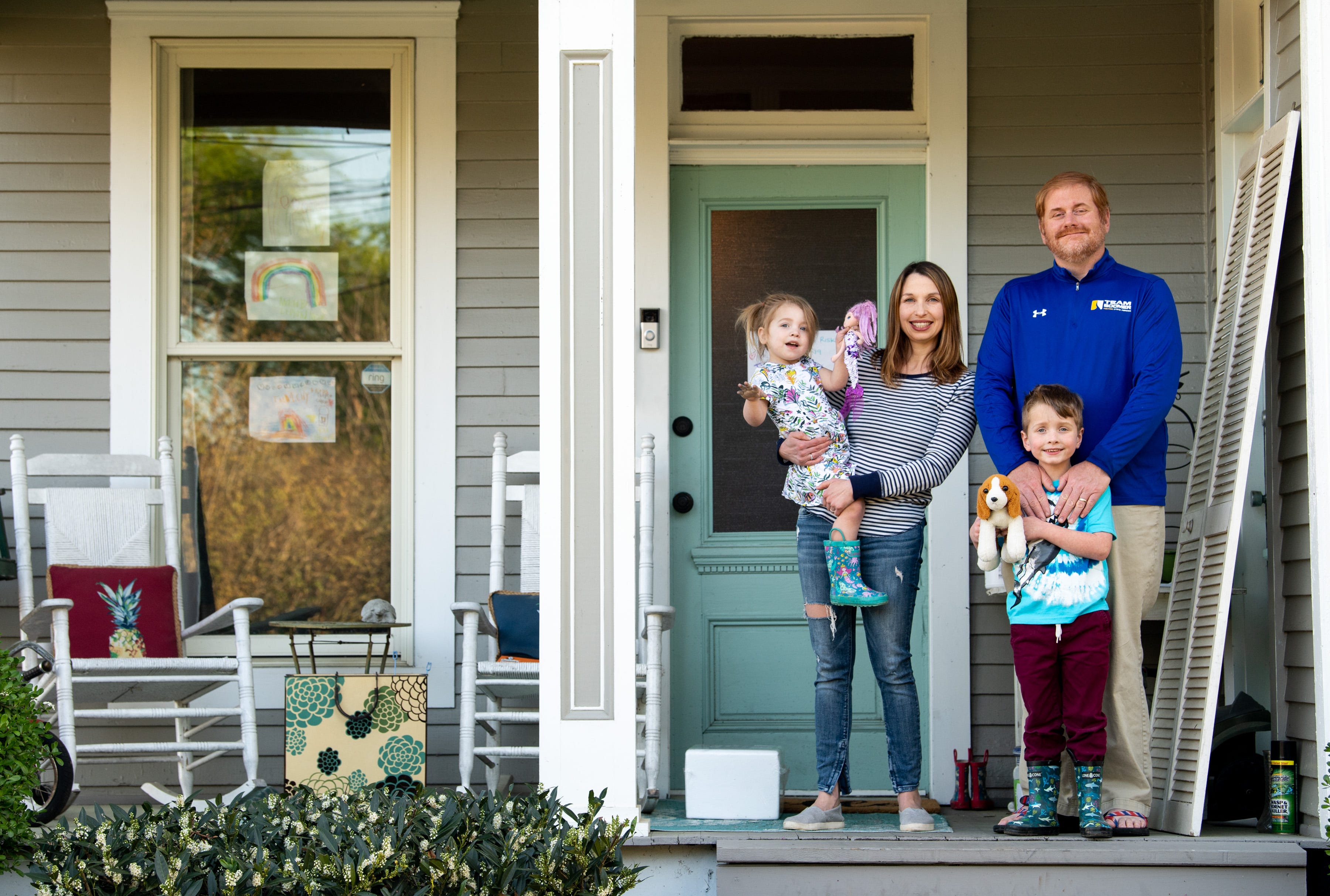 Erin Taylor and her husband, Ron Taylor, pose for a portrait with their children, Carolina Mae, 2, and Levi, 6, at their home in Nashville on Friday, April 10, 2020.