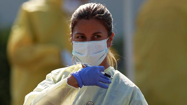 Medical workers in Miami, Florida, in April 2020.