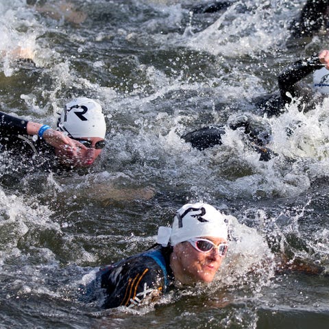 Scenes like this swimming portion of a triathlon w