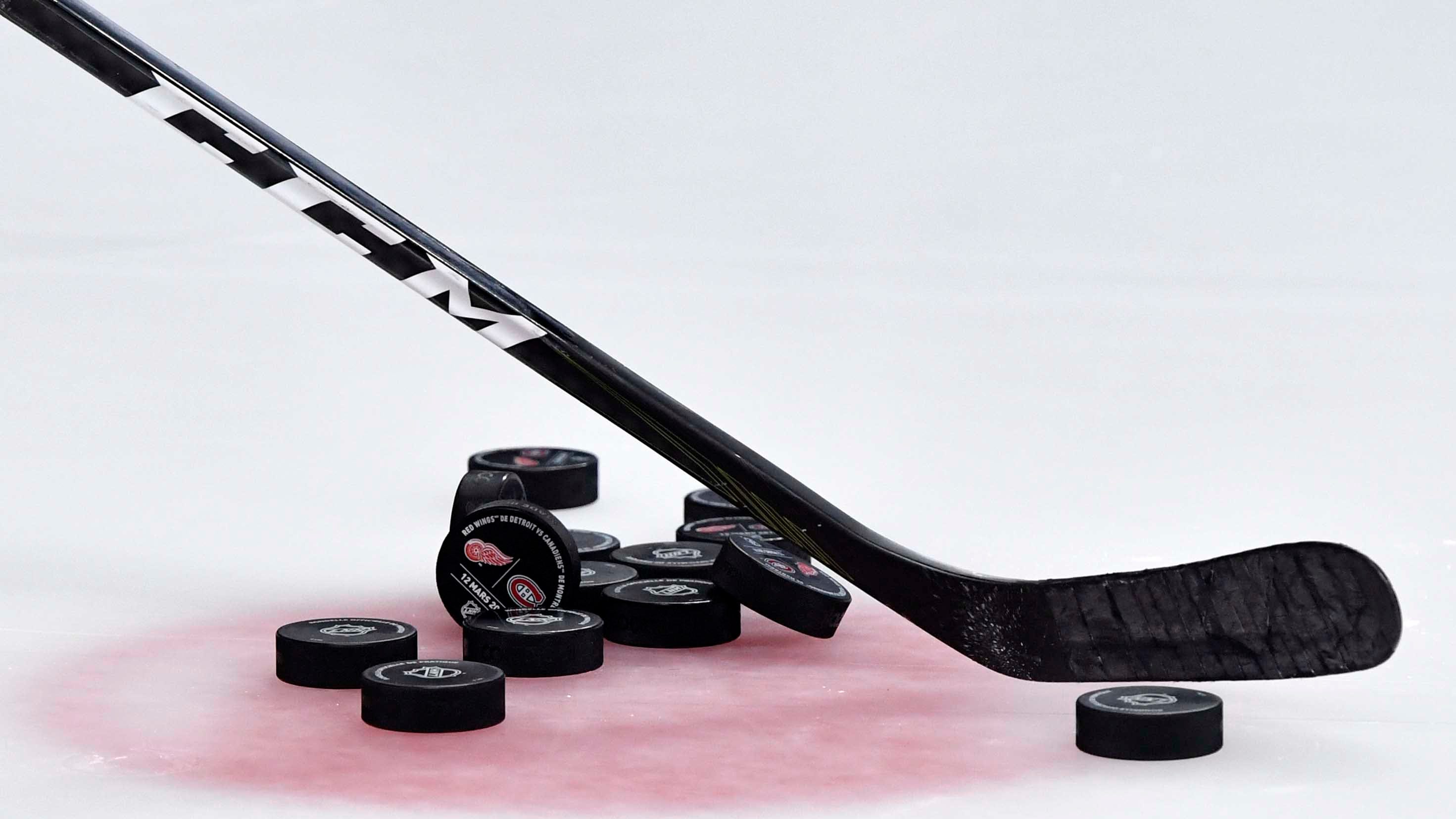 Canadians heed social distancing warnings by using hockey sticks