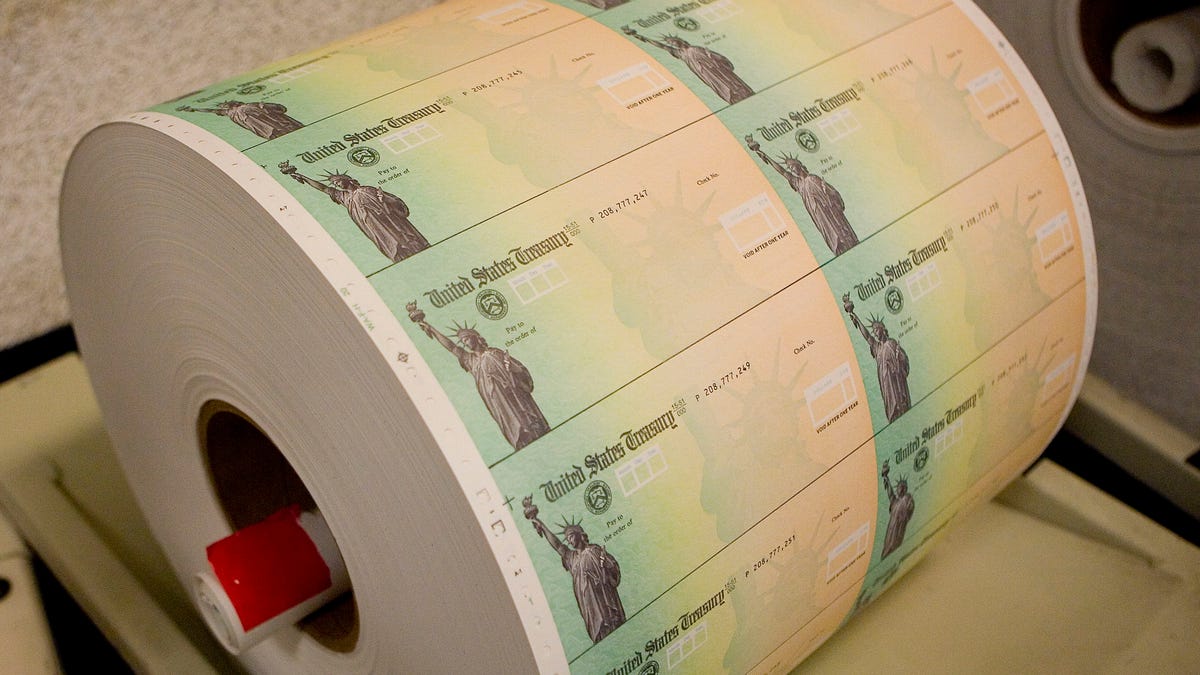 PHILADELPHIA - MAY 8:  Economic stimulus checks are prepared for printing at the Philadelphia Financial Center May 8, 2008 in Philadelphia, Pennsylvania. One hundred and thirty million households are eligible to receive a tax rebate check under the $168 billion economic stimulus plan.  (Photo by Jeff Fusco/Getty Images) ORG XMIT: 80561618 GTY ID: 61618JF001_STIMULUS
