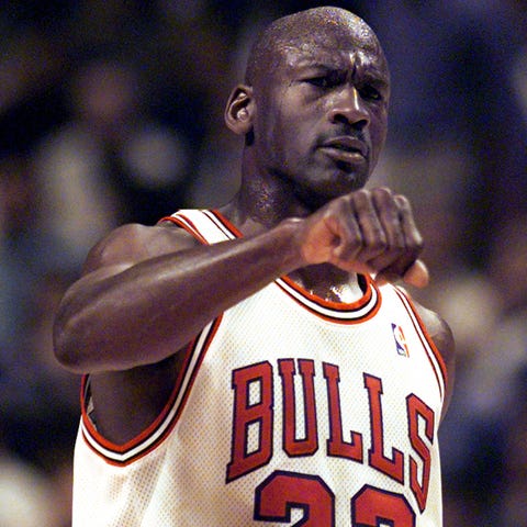 Chicago Bulls  guard Michael Jordan (23) celebrate