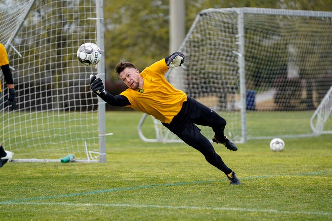 Darian McCauley dives to make a save during a Charleston Battery practice. The West York High graduate and Millersville standout signed a contract with the USL Championship squad in February.