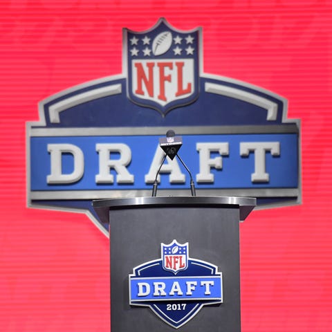The podium with draft logo at the first round of t