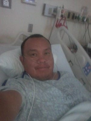 Nelvin Clitso, a 37-year-old Cow Springs-native, said he was hospitalized for nearly two weeks after testing positive for the new coronavirus on April 1, 2020.