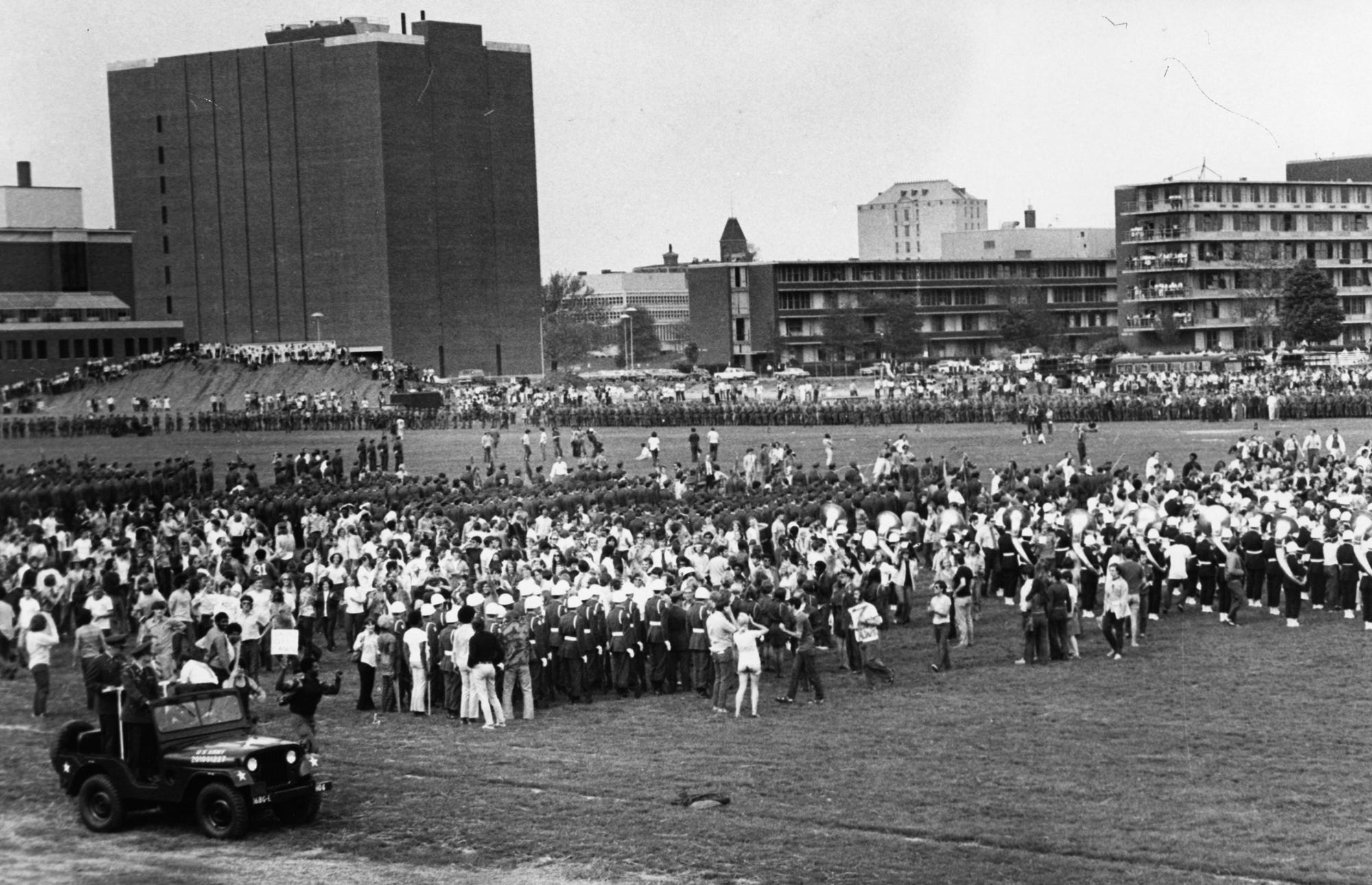 Crowds line the Ohio State University intramural fields as ROTC units are reviewed and protesters join a march on May 6, 1970, two days after four students were killed protesting the Vietnam War at Kent State University.