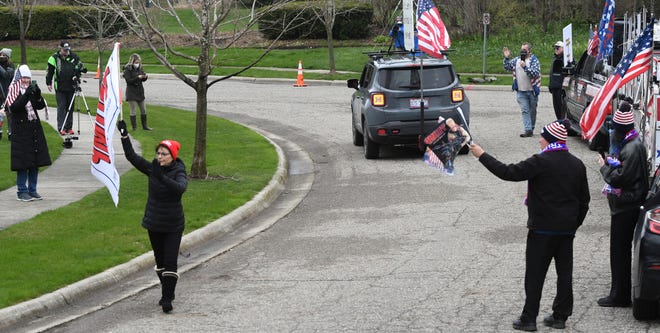 Protesters Gather Outside Whitmer S Lansing Residence Over Stay Home Order