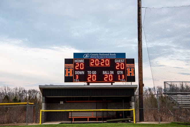 The village of Homer honors the class of 2020 by lighting up their scoreboard on Thursday, April 23, 2020 in Homer, Mich.