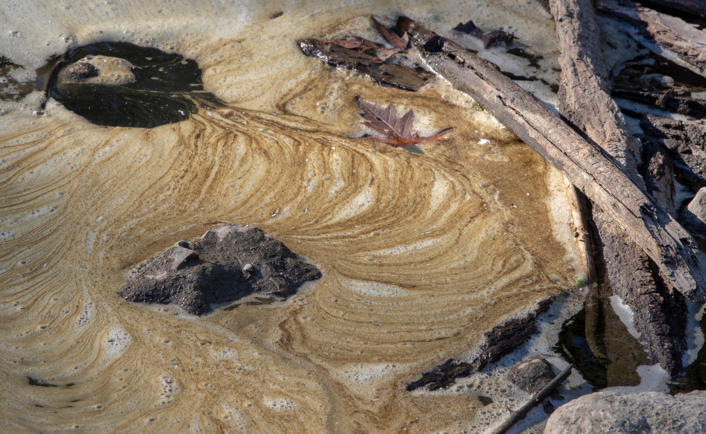 Fall Creek, which dumps directly into White River and is seen here on Oct. 4, 2019, has carried dead bodies, trash and sewage over the years